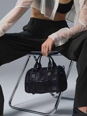 Black Mini Duffel Bag - Sleek Handheld Tote